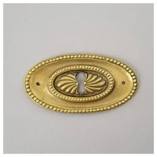 Pressed Oval Escutcheon