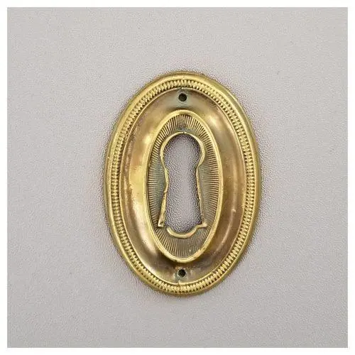 Pressed Oval Escutcheon