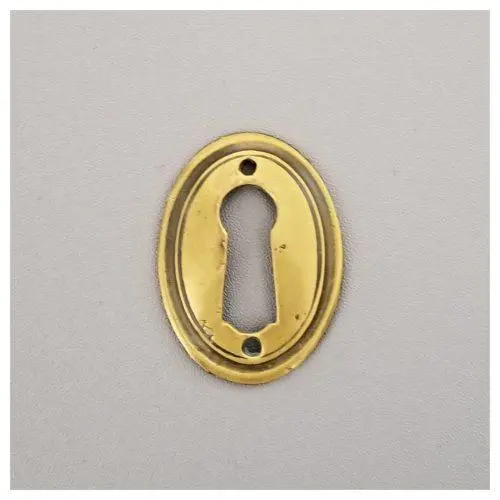 Pressed Oval Escutcheon